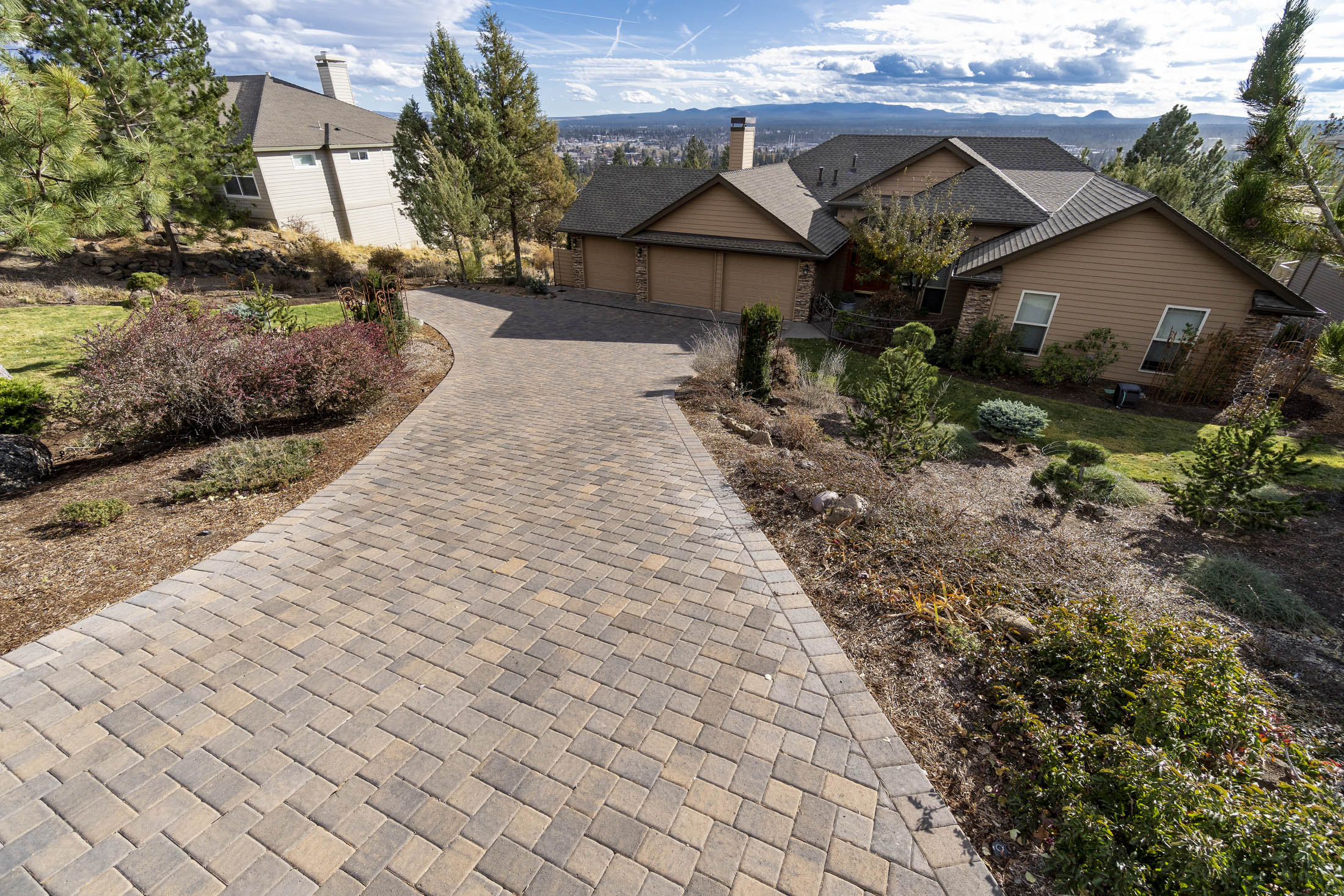 Paved driveway in front of a home.